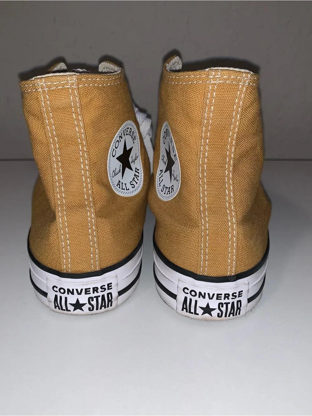 Converse Chuck Taylor All Star High Top Sneakers in Mustard Yellow